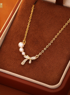 XKDDCT蝴蝶结珍珠项链高级感简约
