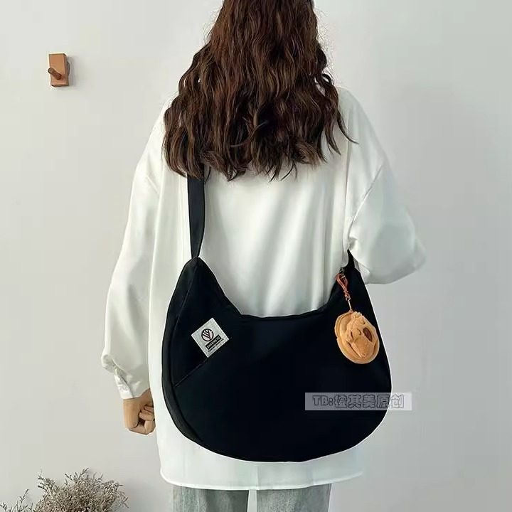 日系饺子包帆布包女时尚流行单肩包简约百搭通勤斜挎包上课书包袋,淘宝优惠券,粉丝福利购,淘宝优惠卷