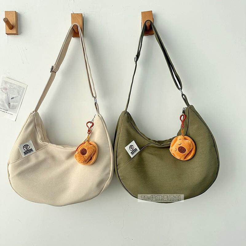 日系饺子包帆布包女时尚流行单肩包简约百搭通勤斜挎包上课书包袋,淘宝优惠券,粉丝福利购,淘宝优惠卷