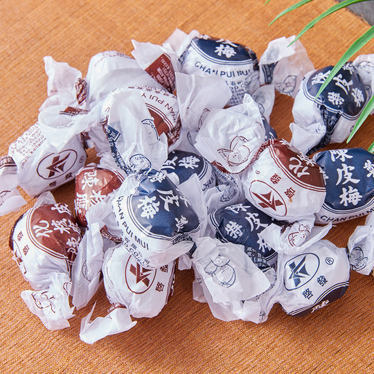 Imported from Hong Kong, paper-wrapped core and dried tangerine peel are added