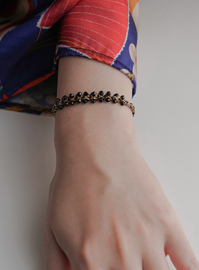 THISNESS纯银镀金黑尖晶编织手链