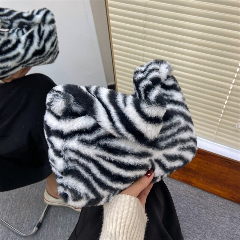 设计小众包手提女小包豹纹2025新款时尚单肩毛毛包托特包简约通勤,淘宝优惠券,粉丝福利购,淘宝优惠卷