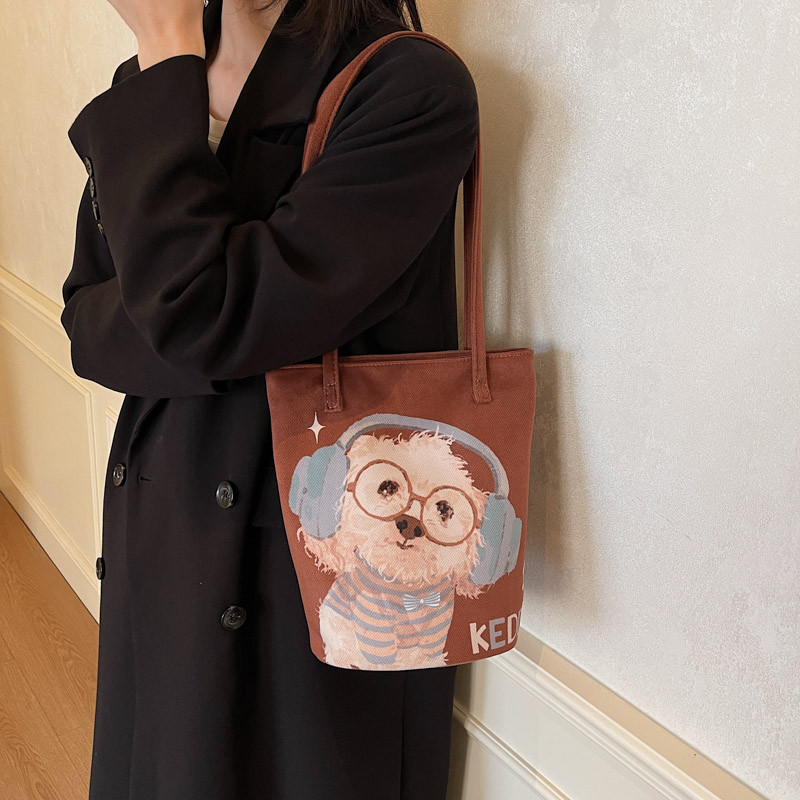 原创耳机小白布袋定制水桶包上班通勤设计感小众装书百搭手拎包,淘宝优惠券,粉丝福利购,淘宝优惠卷