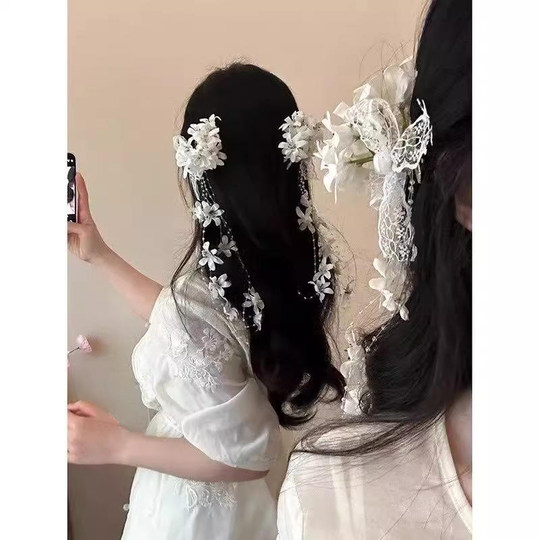 超仙仿真铃兰花流苏发夹女2025新款氛围感拍照侧边夹森系头花发饰