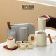 Beige portable travel tea set with tea jar