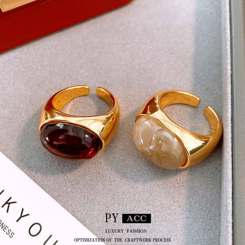 Oval ring with elegant electroplated jade resin opening