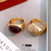 Oval ring with elegant electroplated jade resin opening