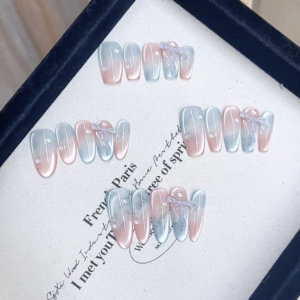 清冷气质感冰透浅粉蓝追光猫眼渐变透明水珠立体飘带蝴蝶结美甲,淘宝优惠券,粉丝福利购,淘宝优惠卷