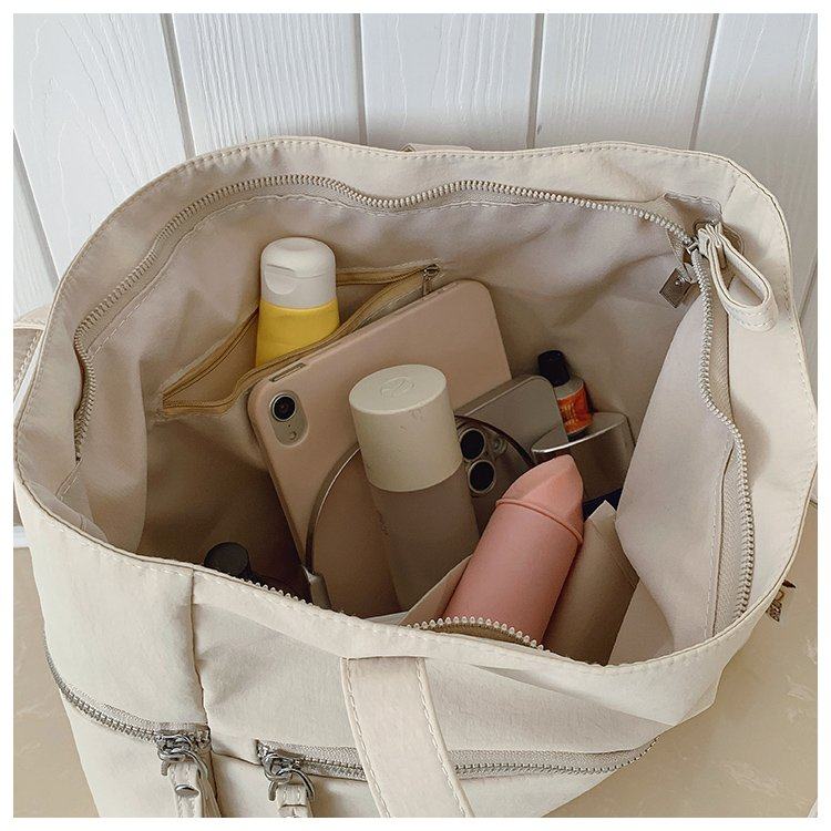 潮流简约大容量女通勤包托特包2026春季新款通用款女包单肩手提包,淘宝优惠券,粉丝福利购,淘宝优惠卷