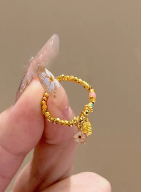 今饰有约金色有钱花珠流苏戒指