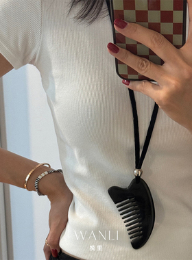 挽里铜镀白金黑色牛角梳毛衣链女