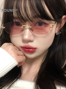 优雅椭圆无框粉镜片女士遮阳镜