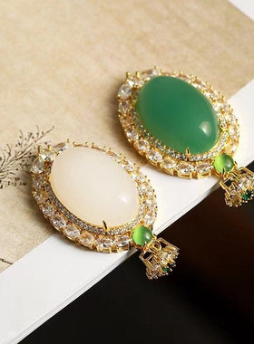 白玉金丝玉蛋面银镶猫眼