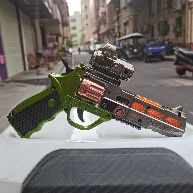 Qunyida electric sound and light toy gun clicks and rings