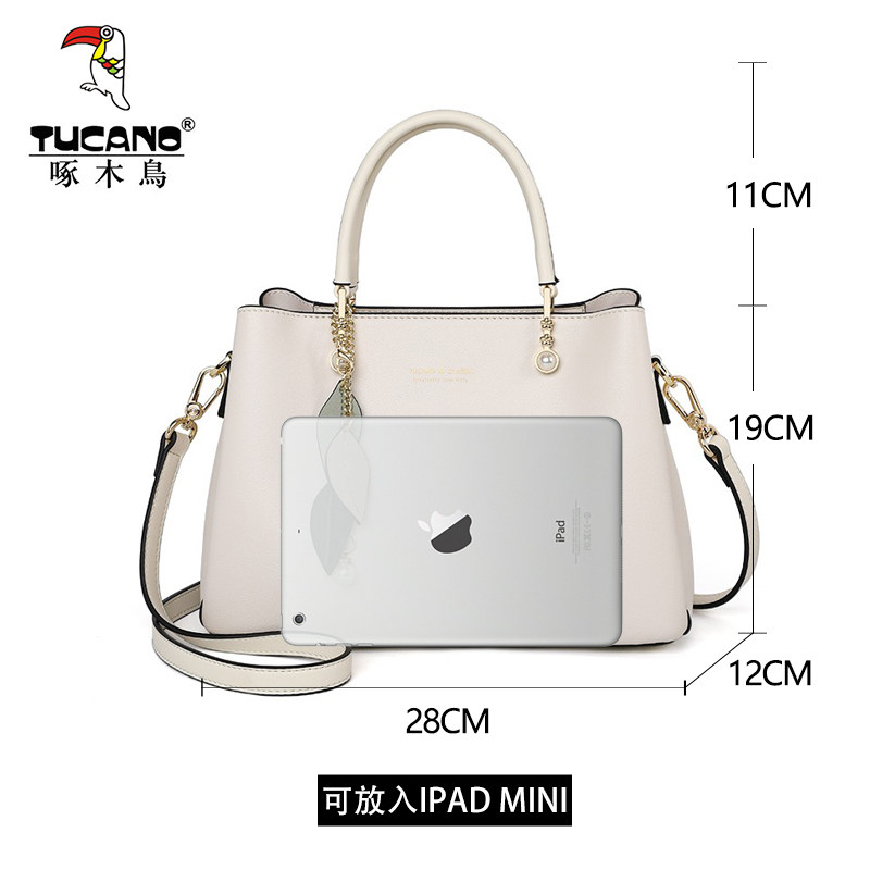 啄木鸟女士2021新款2022手提斜挎包 啄木鸟鑫星女士包袋