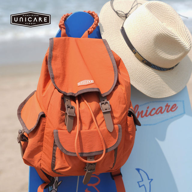 UNICARE ກະເປົ໋າເປ້ແບບ retro ກັນນ້ຳຂະໜາດໃຫຍ່ ເດີນທາງນອກປີນພູ ອຸປະກອນກິລານ້ຳໜັກເບົາ 2026