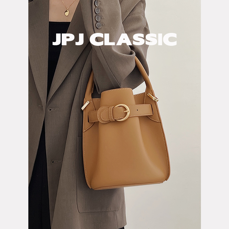 jpjclassic牛皮水桶包女气质单肩斜挎小号琴谱小包包通勤休闲包-图1