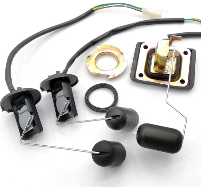 Curved beam motorcycle fuel tank sensor oil float