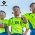 KELME Carl Beauty Football Wear Children ngắn tay Thiết lập cuộc thi đào tạo trẻ Ban ánh sáng thoáng khí Custom Jersey - Bóng đá Bóng đá