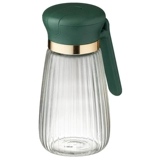 Масляный горшок кухня, предоставляя высокую стеклянную приправу.