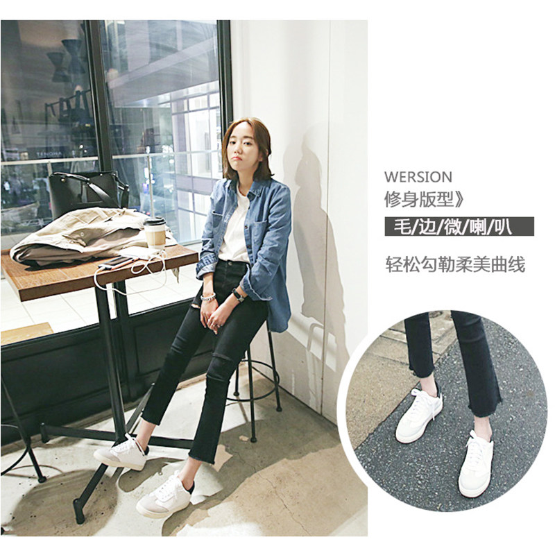 不规则黑色个性破洞高腰潮9牛仔裤 冰雪丹尼牛仔裤