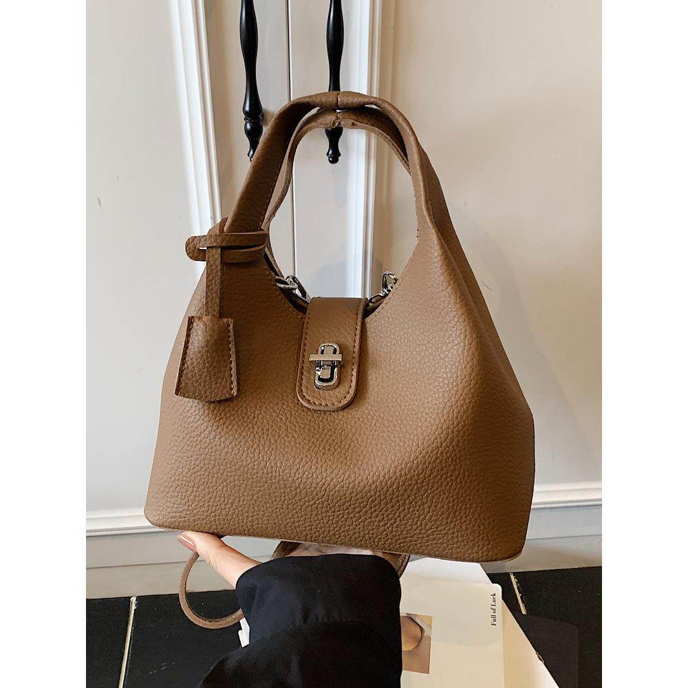 韩版复古手提水桶包女2025冬季新款日常休闲单肩包小众通勤斜挎包,淘宝优惠券,粉丝福利购,淘宝优惠卷