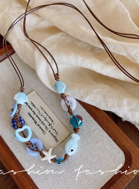 浅蓝色星星小鱼纽扣编织项链女秋季新款度假风海边小清新卫衣项饰