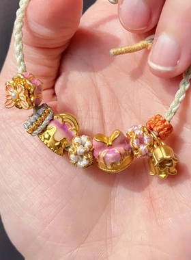 宝藏女孩蛋糕系列转运珠仿黄金珐琅可转动路路通手链串珠子