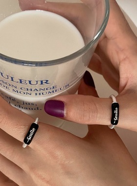 一恋甜美字母戒指女简约时尚黑色滴釉Smile个性时尚开口指环ins食