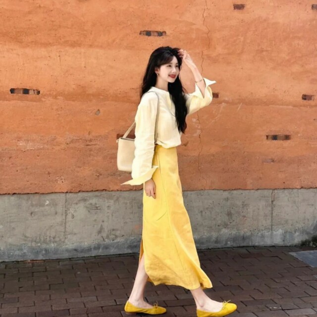 French high-end long-sleeved shirt and yellow tie skirt