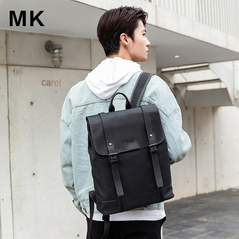 mk男士休闲真皮大容量大学生旅行包 partyplus双肩背包