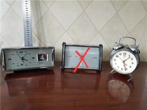 80s alarm clock is taunted with three single selling