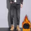 Men's jeans slim fit small feet spring and autumn 2026 new hot style Guangzhou Xintang Town stretch high-end pants autumn