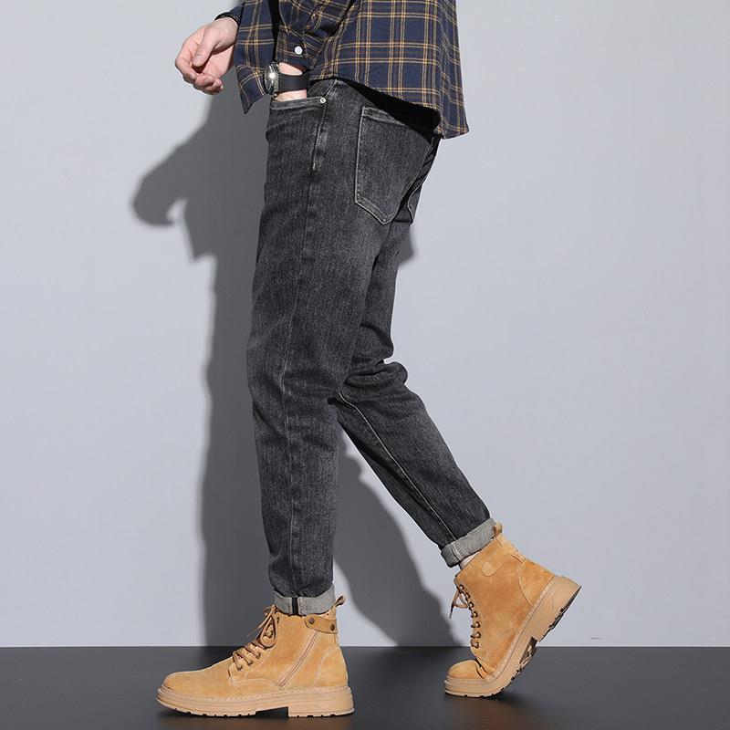 Men's jeans slim fit small feet spring and autumn 2026 new hot style Guangzhou Xintang Town stretch high-end pants autumn