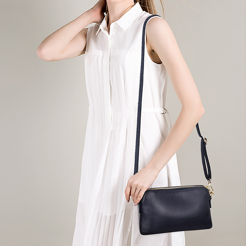 澳迪佳女2020新款真皮贝壳包手拿包 澳迪佳女士包袋