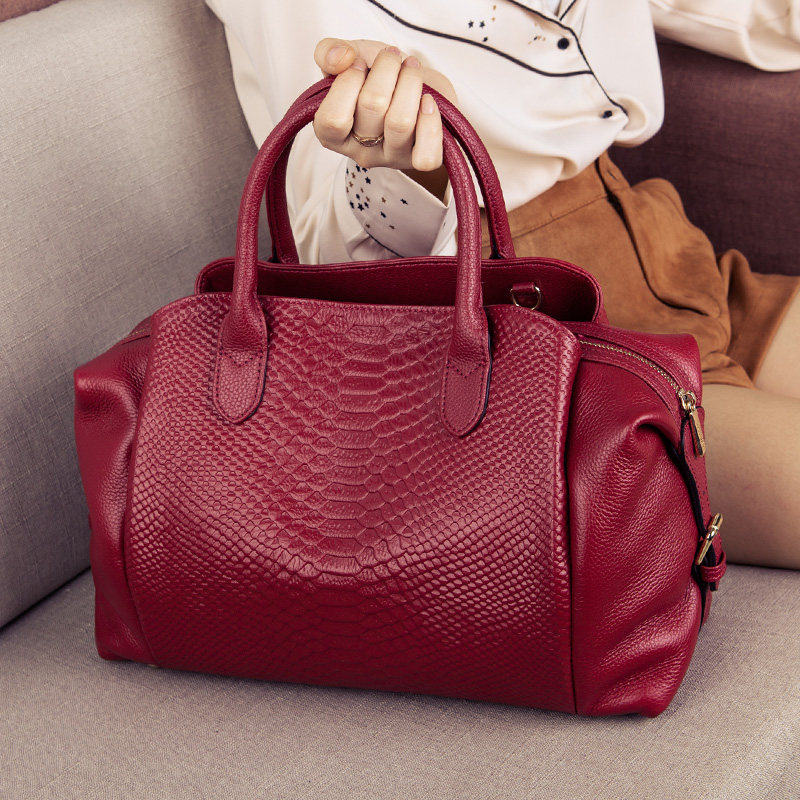 澳迪佳女2020新款潮真皮波士顿包 澳迪佳女士包袋