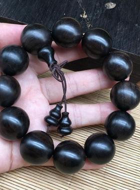 2025沉水黑檀木紫光檀佛珠手串男顺纹小孔手工打磨无蜡无漆20mm