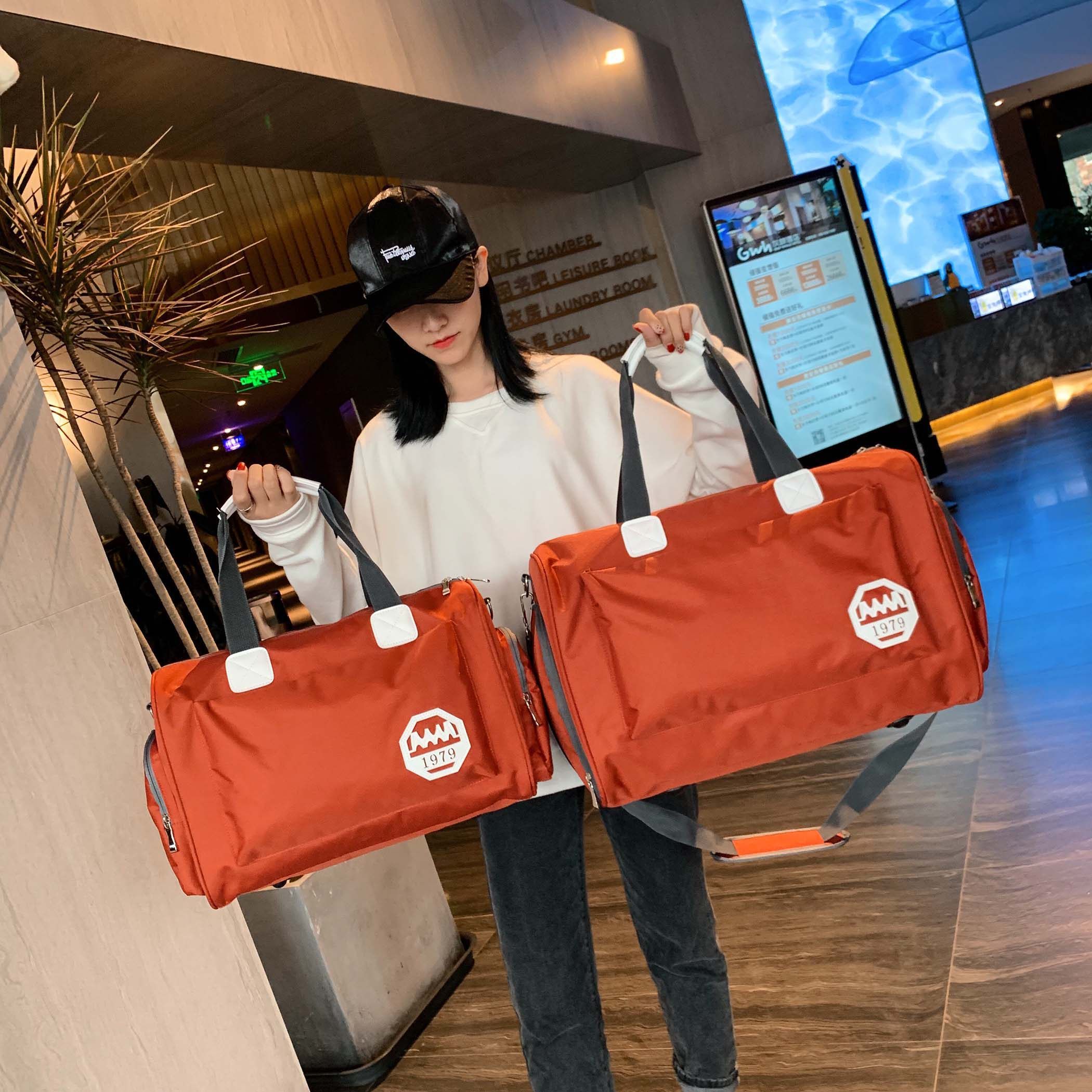 翼希旅行包韩版大容量短期健身包包 翼希旅行袋