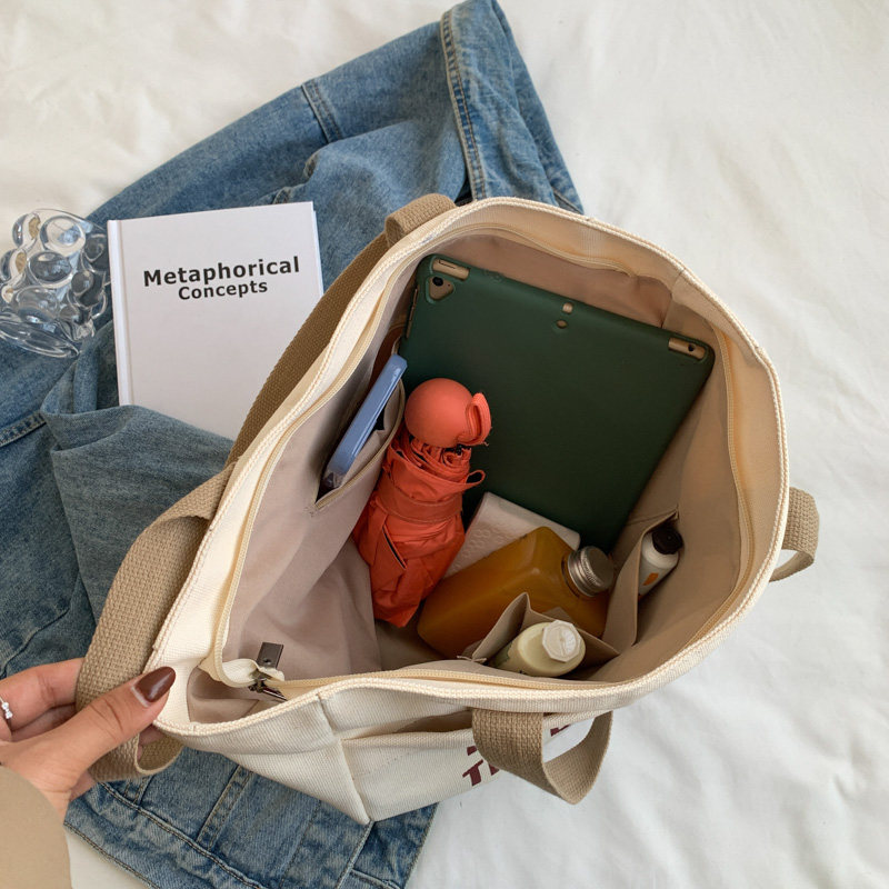 大容量通勤单肩女2023新款帆布包包 圣利威女士包袋