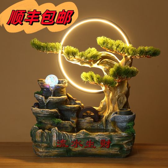 Brunnen mit Steingarten und fließendem Wasser zur Einweihungsfeier