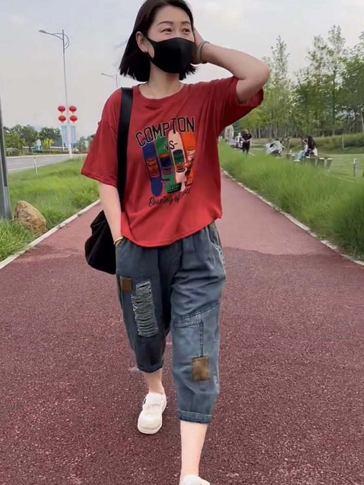 洋气时尚两件套装女2023年夏新款印花短袖T恤+薄款水洗牛仔哈伦裤,淘宝优惠券,粉丝福利购,淘宝优惠卷