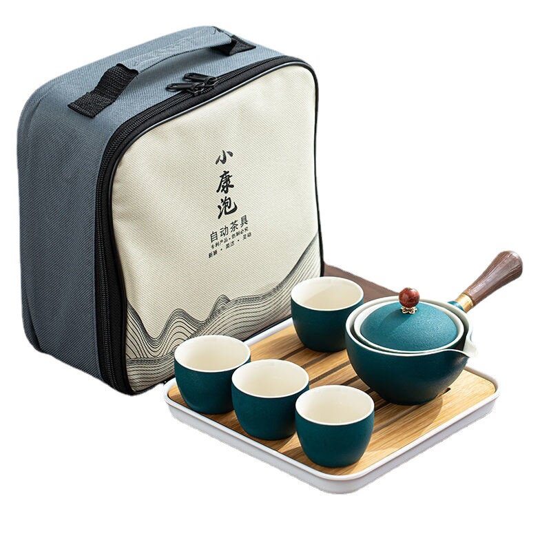 Portable travel tea set complete set of ceramic kung fu automatic rotating one pot four cups side handle tea maker