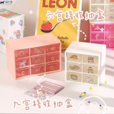 Собрание симпатичной маленькой вещи, общежитие для хранения комнаты и разные предметы ставят небольшие объекты.