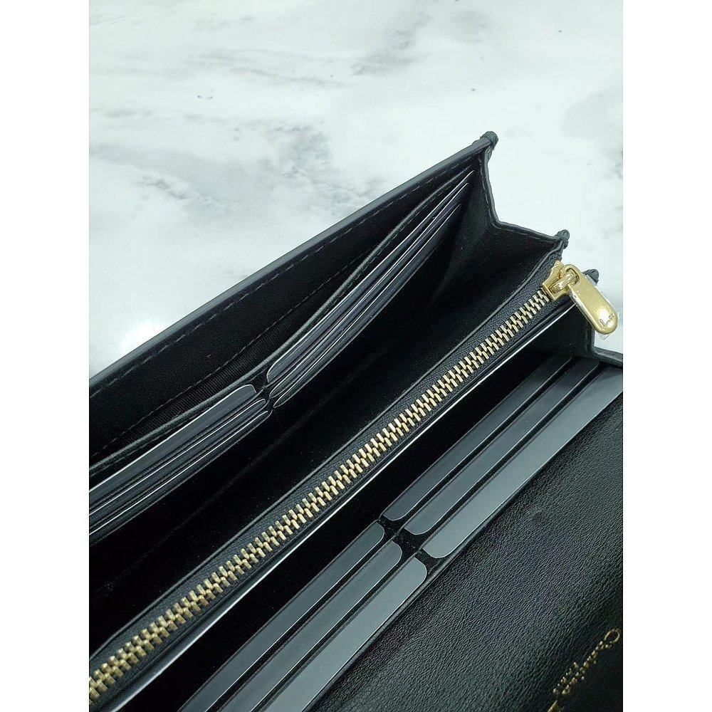  天猫国际探物中国香港手拿包