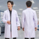 Male medical student in white coat laboratory lab coat chemistry