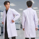 Male medical student in white coat laboratory lab coat chemistry
