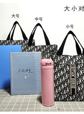 韩版简约时尚手提袋A4手拎包帆布大容量上班族饭盒包外出妈咪包