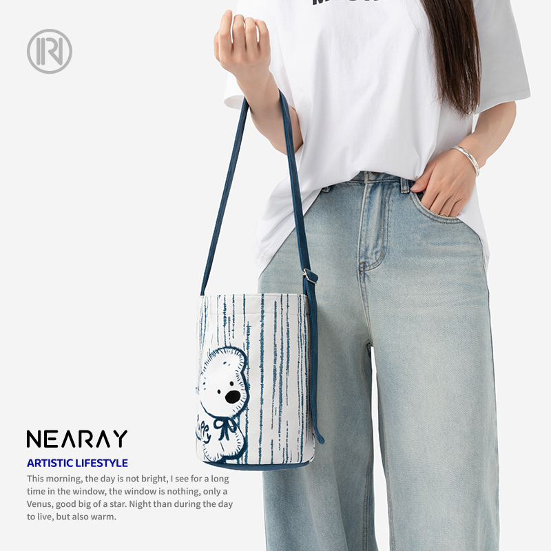 尼睿新款原创清新小狗水桶包可爱休闲简约百搭斜挎帆布包包女AC - 图3