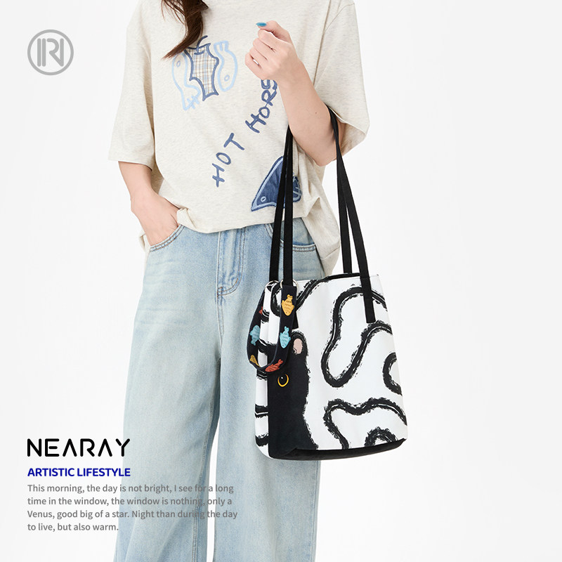 尼睿新款小煤球百搭小众休闲六边形包单肩书店大容量帆布包Z006,淘宝优惠券,粉丝福利购,淘宝优惠卷