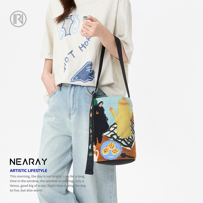 尼睿原创小煤球的下午茶可爱帆布包小众文艺百搭时尚水桶包Z054,淘宝优惠券,粉丝福利购,淘宝优惠卷